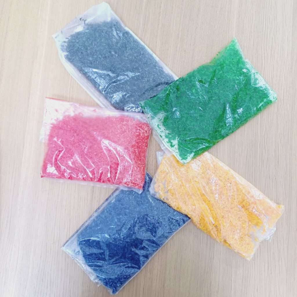 colored rice in the ziplock bags