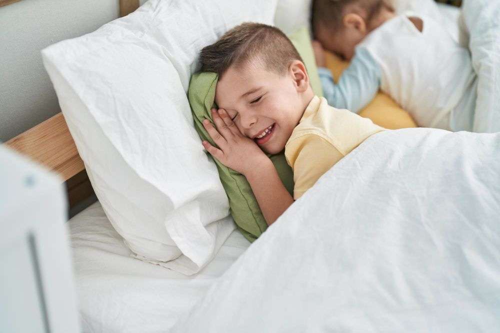 boy sleeping  in the bed 