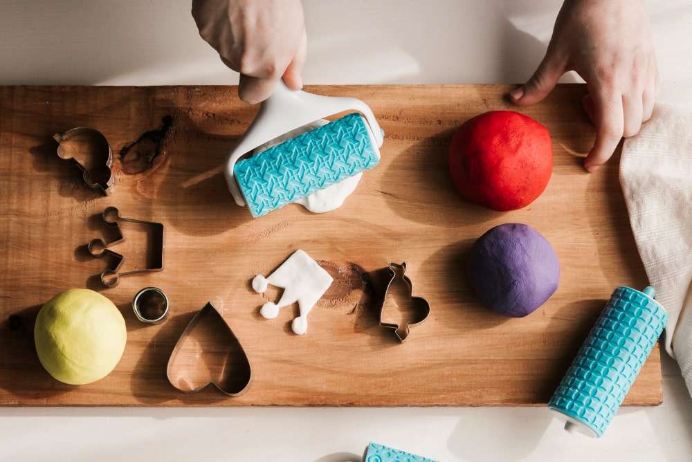 child playing with playdough